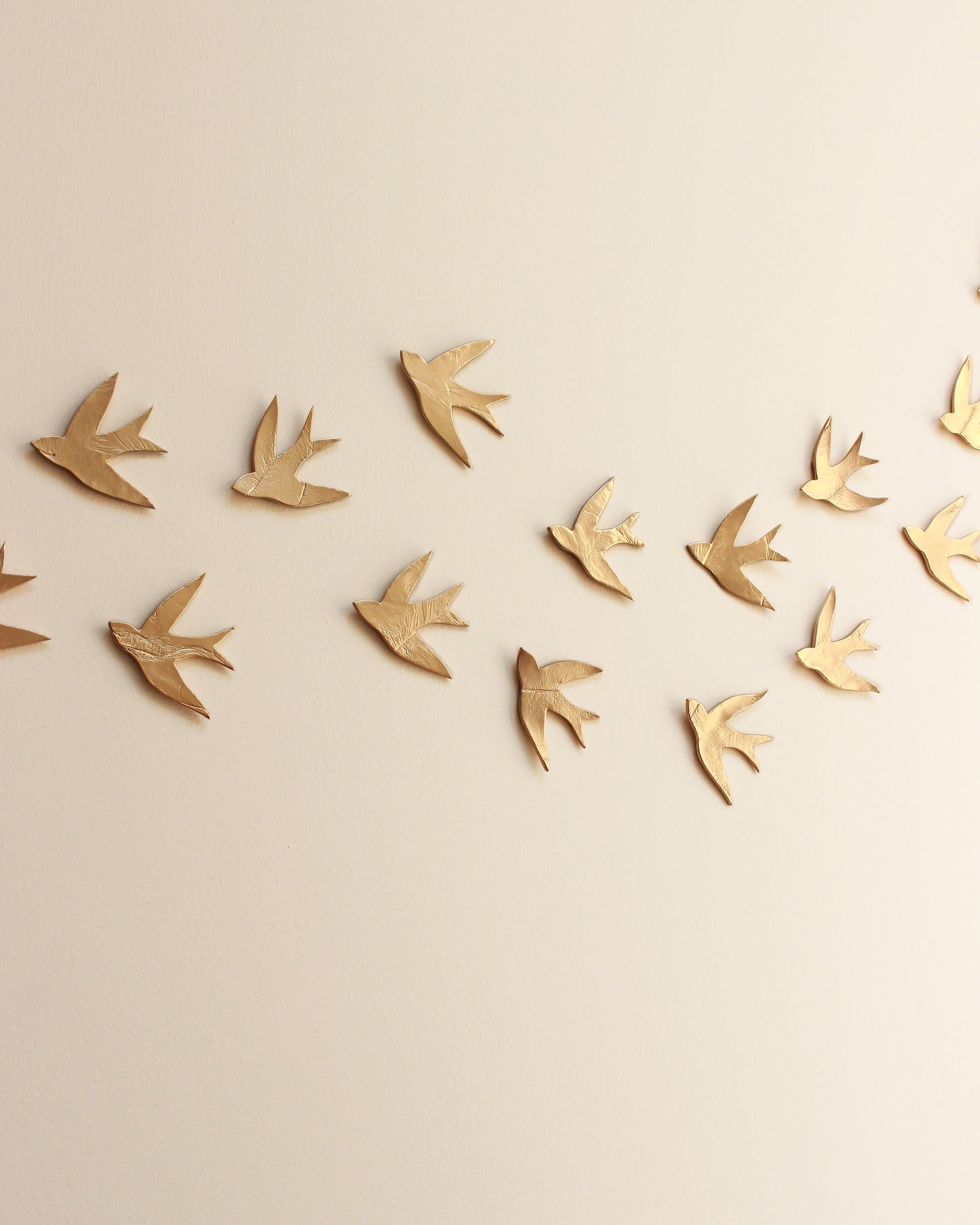 Swallows in the Sahara Gold Ceramic Swallow Wall Art, Set of 15, Handmade Pottery