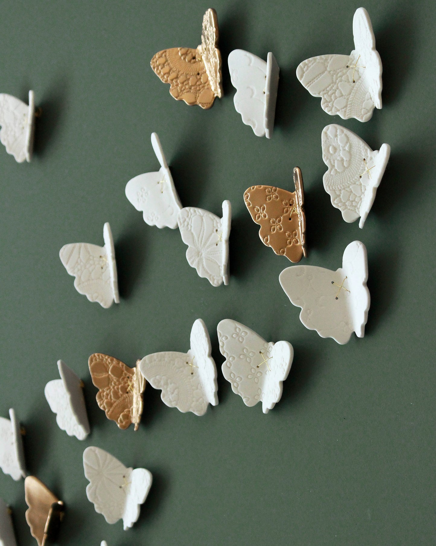 3D Set of 22 Ceramic Butterflies Finished in a Mix of Light Green, Dark Olive and White Porcelain