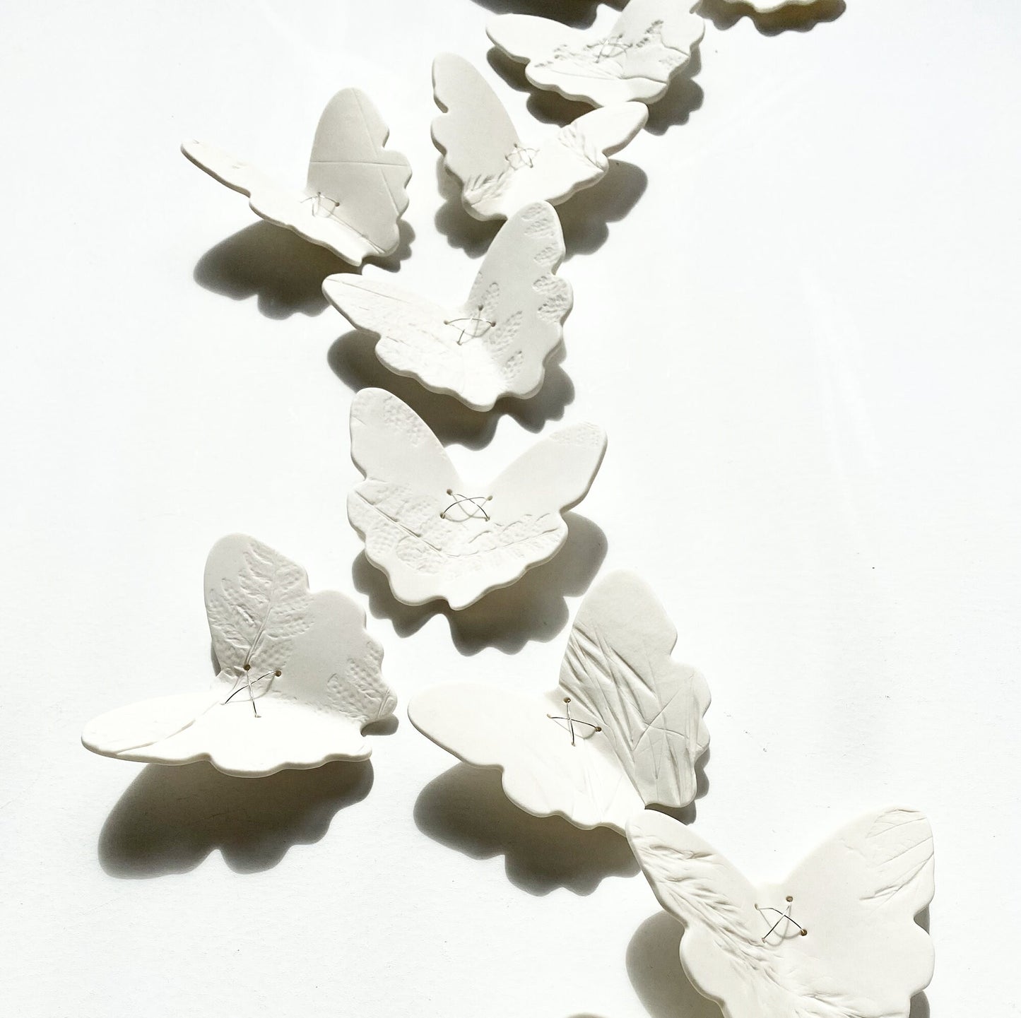 Original art Butterfly meadow large wall artwork circle Porcelain sterling silver Ceramic wall sculpture Wildflower botanical art Set of 25