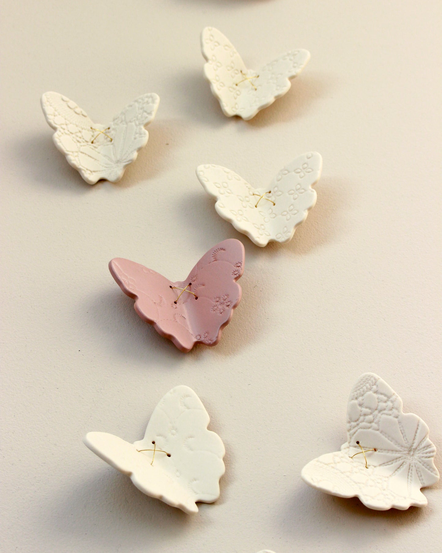 3D Set of 22 Ceramic Butterflies Finished in a Mix of Light Green, Dark Olive and White Porcelain