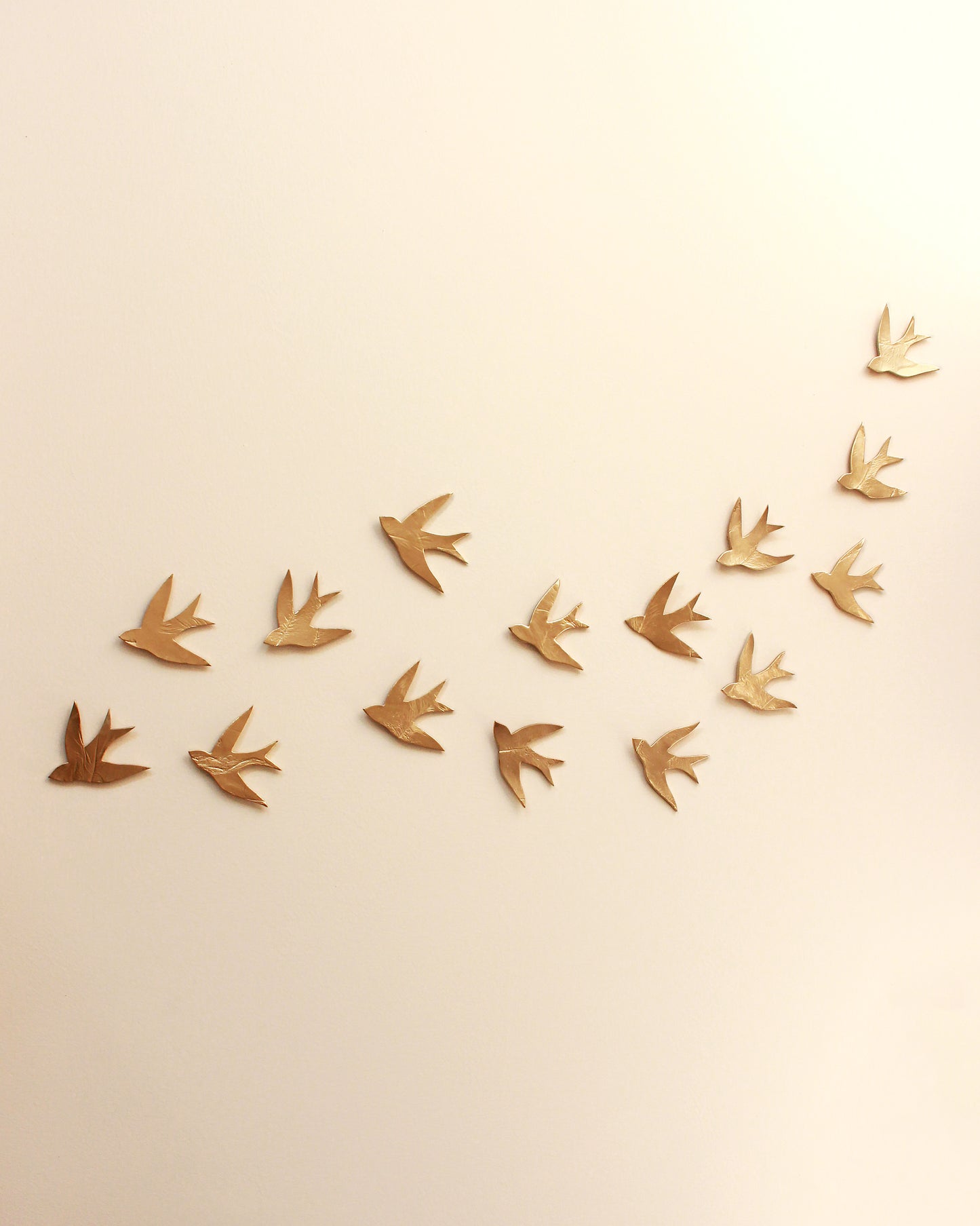 Swallows in the Sahara Gold Ceramic Swallow Wall Art, Set of 15, Handmade Pottery