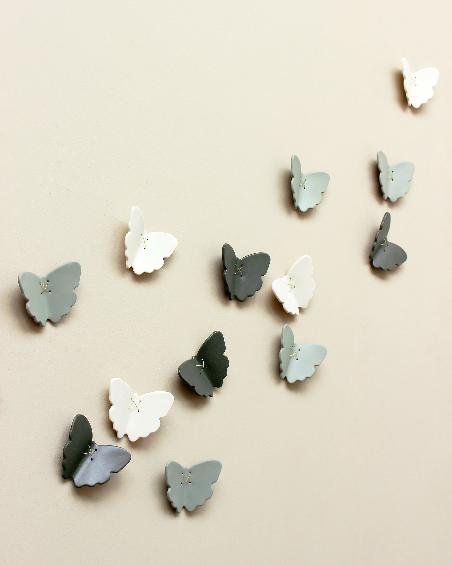 3D Set of 22 Ceramic Butterflies Finished in a Mix of Light Green, Dark Olive and White Porcelain