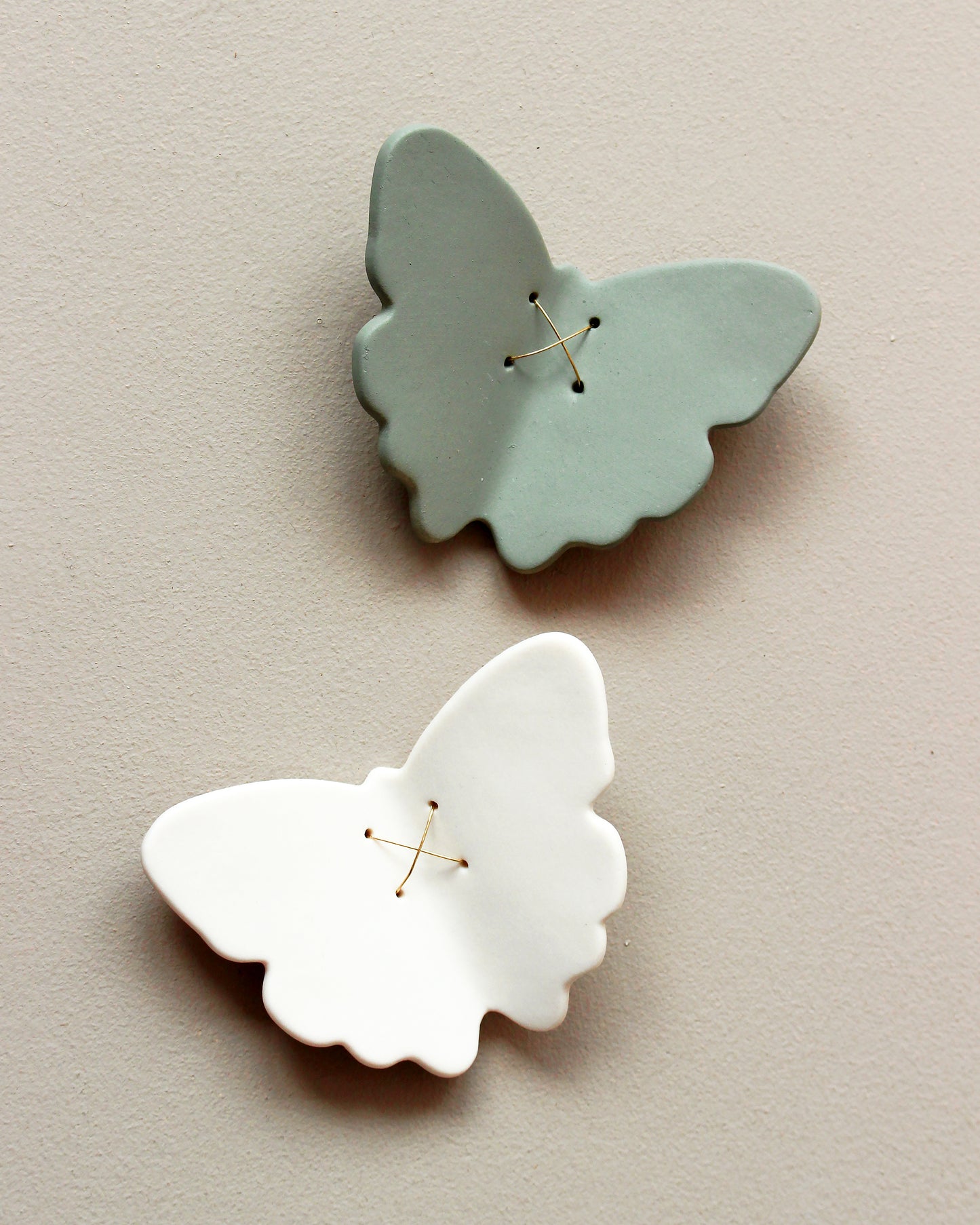 3D Set of 22 Ceramic Butterflies Finished in a Mix of Light Green, Dark Olive and White Porcelain