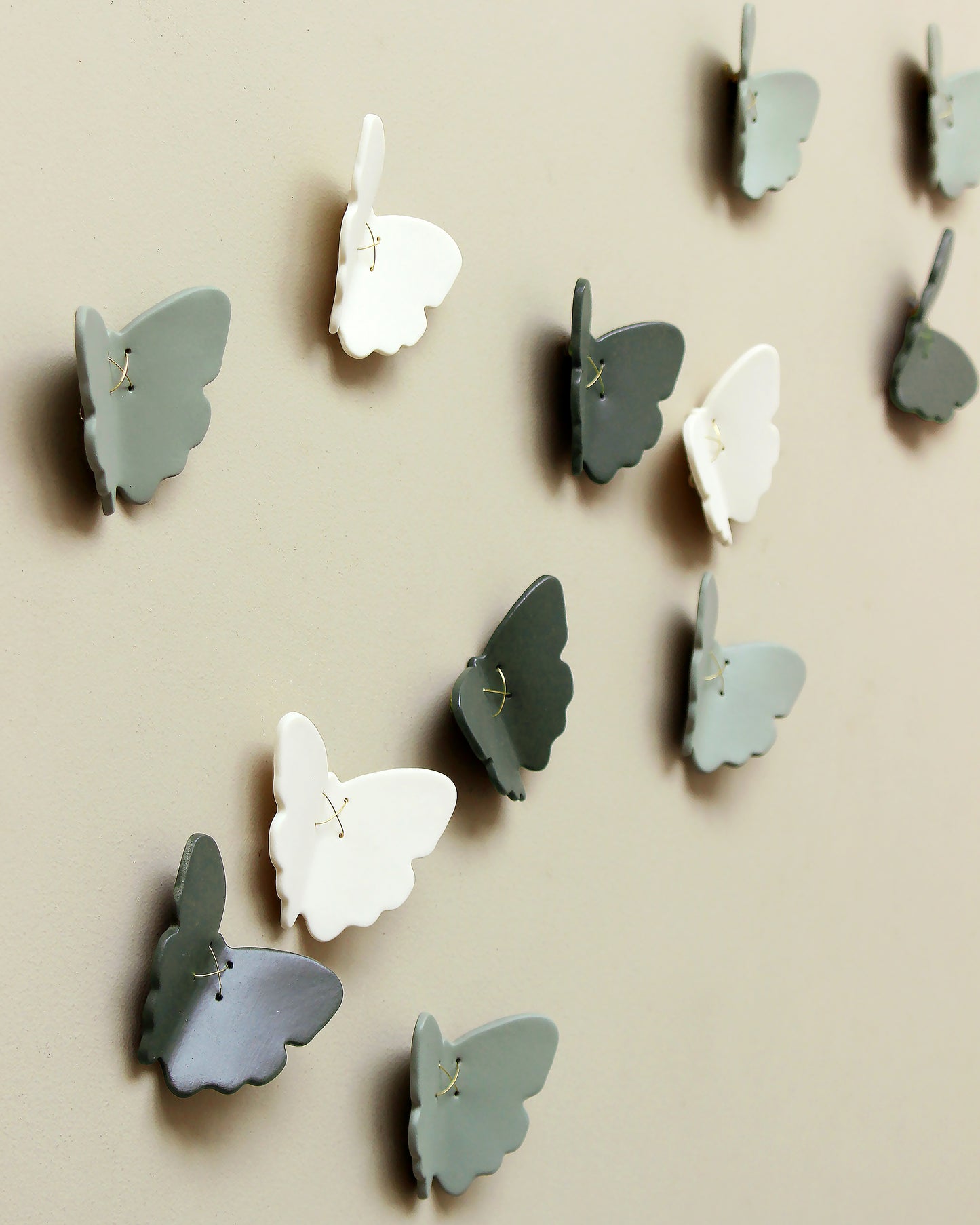 3D Set of 22 Ceramic Butterflies Finished in a Mix of Light Green, Dark Olive and White Porcelain